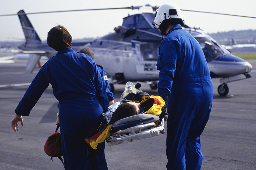 Carrying patient to helicopter