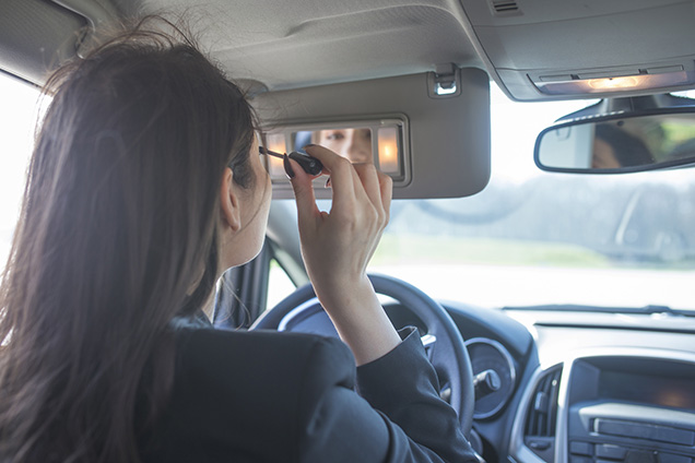 applying makeup while driving