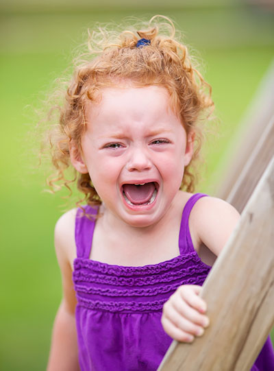 young girl throwing a tantrum
