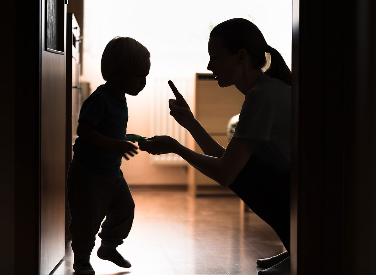 Toddler being scolded