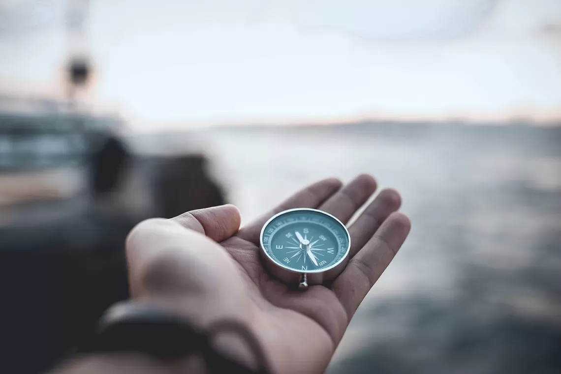 Sailor holding a compass