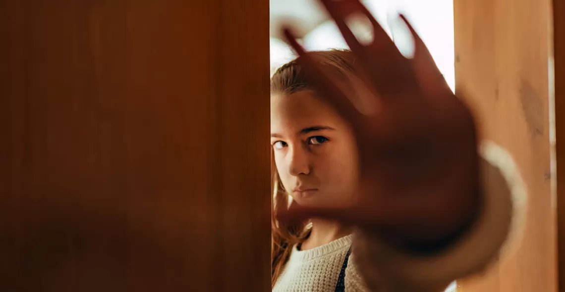 Girl holding stopping with hand