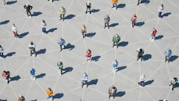 Graphic of people connected by a grid on concrete