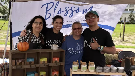 The Blossom crew all set up at a market